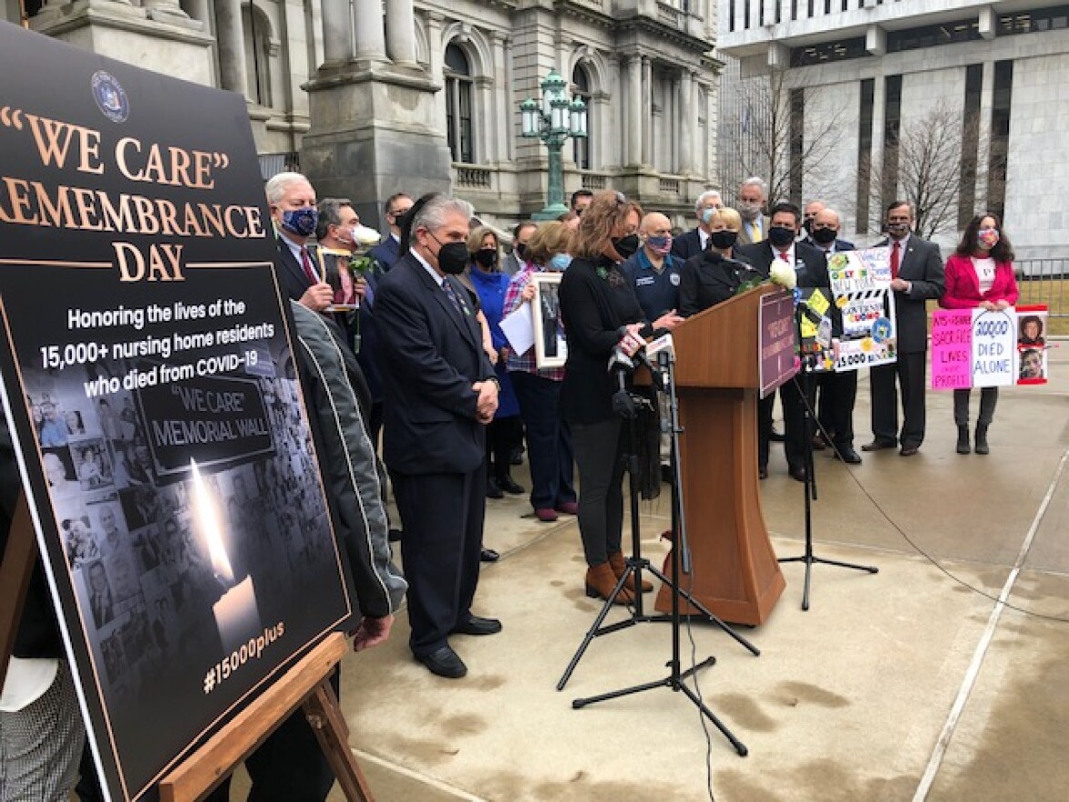 State lawmakers and relatives of New Yorkers who died of COVID-19 in nursing homes during the pandemic held a Day of Remembrance outside the State Capitol. 